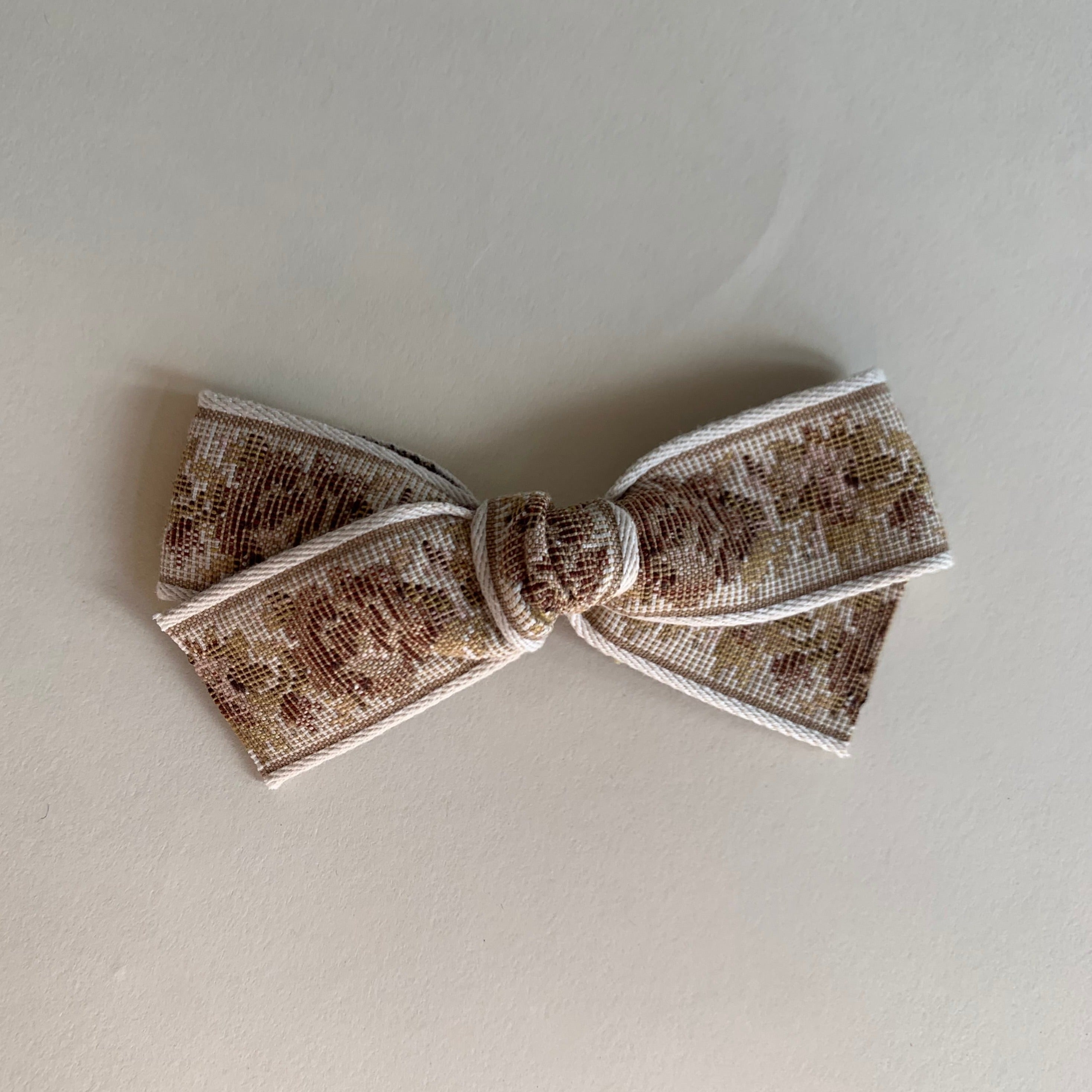 Small bow // brown tapestry vintage floral