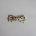 Small bow // yellow orange floral vine