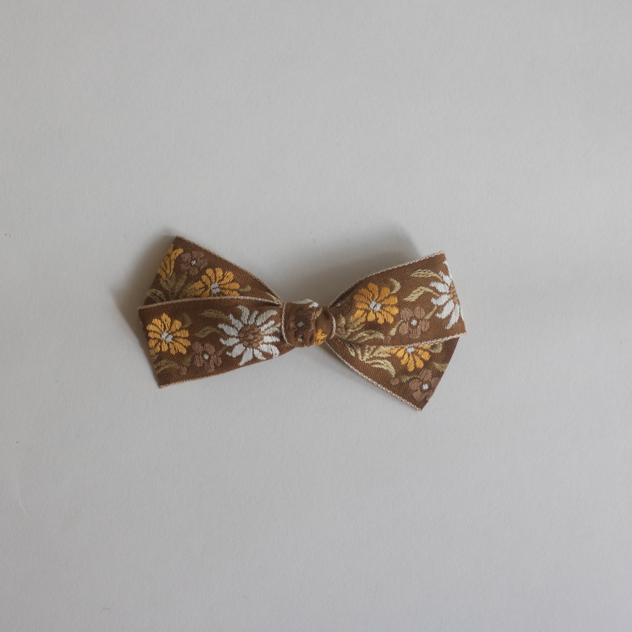 Small bow // brown marigold floral